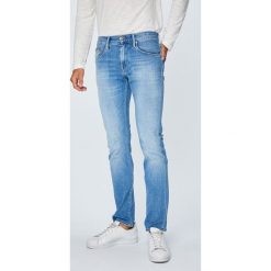 Tommy Hilfiger - Jeansy Denton. Niebieskie jeansy męskie z dziurami TOMMY HILFIGER. Za 539,90 zł.