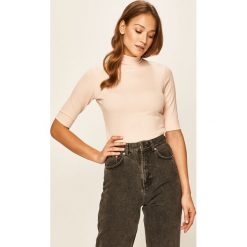 Hummel - Bluzka. Czarne bluzki damskie Hummel, na co dzień, s, z nadrukiem, z elastanu, z golfem, z krótkim rękawem. Za 129,90 zł.