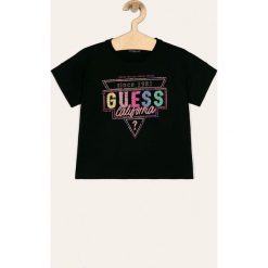 Guess Jeans - T-shirt dziecięcy 118-175 cm. Czarne bluzki dziewczęce Guess Jeans, z aplikacjami, z bawełny, z okrągłym kołnierzem, z krótkim rękawem, krótkie, bez kaptura. Za 139,90 zł.