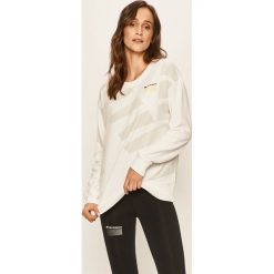 New Balance - Bluza. Białe bluzy damskie New Balance, s, z nadrukiem, z elastanu, bez rękawów, bez kaptura. W wyprzedaży za 179,90 zł.
