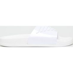 Emporio Armani - Klapki. Żółte klapki damskie Emporio Armani, bez wzorów, z gumy, bez obcasa, na obcasie. W wyprzedaży za 219,90 zł.