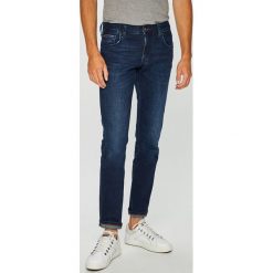 Tommy Hilfiger - Jeansy. Szare jeansy męskie z dziurami marki TOMMY HILFIGER, z bawełny. Za 399,90 zł.