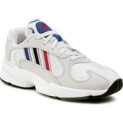 Buty adidas - Yung-1 FV4730 Crywht/Silvmt/Cblack. Białe półbuty męskie Adidas, na co dzień, bez wzorów, ze skóry, bez zapięcia. Za 499,00 zł.