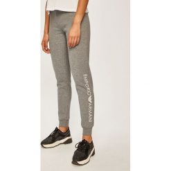 Emporio Armani - Spodnie. Niebieskie spodnie damskie Emporio Armani, s, z elastanu. Za 359,90 zł.