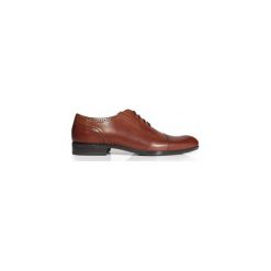 Brązowe półmatowe brogsy T130. Pomarańczowe buty wizytowe męskie Modini Moda Męska, ze skóry, bez zapięcia. Za 270,00 zł.