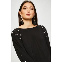 Medicine - Bluzka Vintage Revival. Czarne bluzki damskie marki MEDICINE, s, z wiskozy, casualowe, z dekoltem w łódkę, z długim rękawem. W wyprzedaży za 39,90 zł.