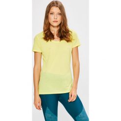 Under Armour - Top. Żółte topy damskie marki Under Armour, s, z elastanu, z okrągłym kołnierzem. W wyprzedaży za 89,90 zł.