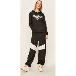 Reebok - Spodnie sportowe. Czarne spodnie damskie Reebok, s, bez wzorów, z poliesteru. Za 179,90 zł.