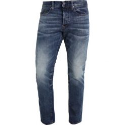 GStar 3301 TAPERED Jeansy Zwężane dk aged. Niebieskie jeansy męskie G-Star. W wyprzedaży za 365,40 zł.