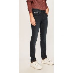 Tommy Hilfiger - Jeansy Denton. Niebieskie jeansy męskie TOMMY HILFIGER, bez wzorów, z obniżonym stanem. Za 429,90 zł.
