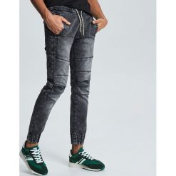 Jeansy slim jogger z przeszyciami - Szary. Szare jeansy męskie Cropp, m, bez wzorów. Za 139,99 zł.