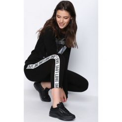 Czarna Bluza Like an Angel. Czarne bluzy damskie Born2be, na jesień, l. Za 34,99 zł.