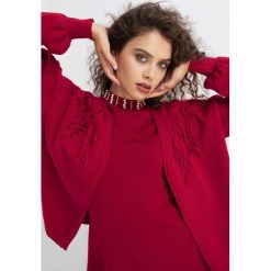 Kardigan oversize. Czerwone kardigany damskie Orsay, s, z dzianiny. W wyprzedaży za 55,00 zł.