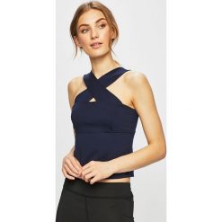Armani Exchange - Top. Niebieskie bluzki damskie Armani Exchange, s, bez wzorów, z elastanu, bez kołnierzyka. W wyprzedaży za 239,90 zł.