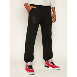 Spodnie dresowe Converse Twisted Varsity 10018340-A03. Czarne jeansy męskie Converse, xl, bez wzorów. W wyprzedaży za 169,00 zł.