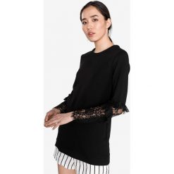Trussardi Jeans Top Czarny. Czarne bluzki damskie Trussardi Jeans, xxs, w koronkowe wzory, z elastanu, bez kołnierzyka, bez rękawów. Za 438,95 zł.