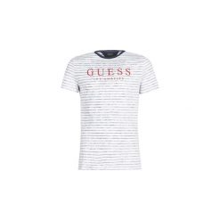 T-shirty z krótkim rękawem Guess ALDEN. Białe t-shirty męskie Guess, s, z aplikacjami, bez kołnierzyka, krótkie. Za 125,30 zł.