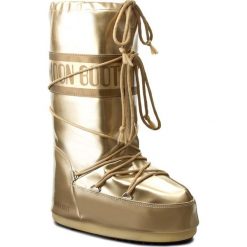 Śniegowce MOON BOOT - Vinile Met. 14021400003 Oro D. Żółte kozaki damskie Moon Boot, na zimę, ze skóry ekologicznej, na niskim obcasie, bez zapięcia. W wyprzedaży za 469,00 zł.