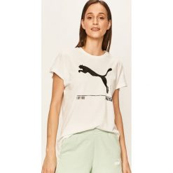 Puma - T-shirt. Białe bluzki damskie Puma, s, z aplikacjami, z elastanu, casualowe, z okrągłym kołnierzem. W wyprzedaży za 89,90 zł.