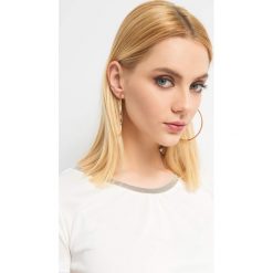 Koszulka z lamówką z koralików. Niebieskie koszulki damskie Orsay, s, bez wzorów, z poliesteru, bez kołnierzyka, z krótkim rękawem. Za 49,99 zł.