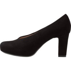 Unisa Czółenka na platformie black. Czarne buty ślubne damskie Unisa, z materiału, na platformie. Za 459,00 zł.