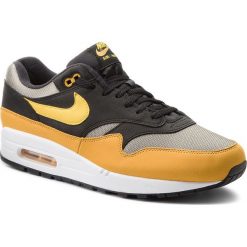 Buty NIKE - Air Max 1 AH8145 001 Dark Stucco/Vivid Sulfur-Black. Żółte półbuty męskie Nike, na co dzień, ze skóry ekologicznej. W wyprzedaży za 479,00 zł.