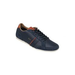 Trampki Lacoste Alisos 117 1 CAM1018003. Niebieskie trampki męskie Lacoste, bez wzorów, bez zapięcia. Za 499,99 zł.