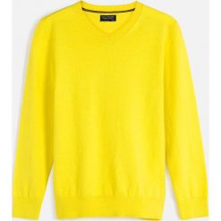Mayoral - Sweter dziecięcy 128-172 cm. Żółte swetry chłopięce Mayoral, bez wzorów, z bawełny, bez kołnierzyka. W wyprzedaży za 89,90 zł.