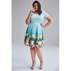 Turkusowa wiosenna sukienka Gabi duże rozmiary OVERSIZE PLUS SIZE WIOSNA. Niebieskie sukienki damskie Moda Size Plus Iwanek, na imprezę, na lato, s, bez wzorów, eleganckie, z okrągłym kołnierzem, plus size, bez rękawów, oversize. Za 195,00 zł.