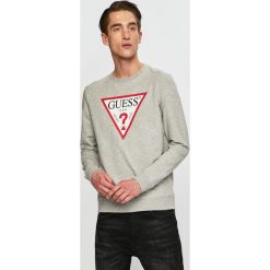 Guess Jeans - Bluza. Szare bluzy męskie Guess Jeans, xl, z nadrukiem, z bawełny, z okrągłym kołnierzem, bez rękawów, bez kaptura. W wyprzedaży za 229,90 zł.