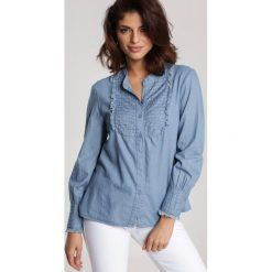 Niebieska Koszula Arrishi. Niebieskie bluzki damskie Renee, s, z aplikacjami, z jeansu, eleganckie, ze stójką, bez rękawów. Za 129,99 zł.