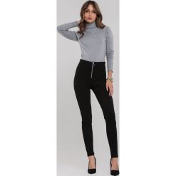 Czarne Legginsy Riggs. Czarne legginsy damskie Renee, xl, bez wzorów, z dzianiny. Za 69,99 zł.