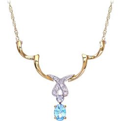 Złoty naszyjnik z diamentami i topazem - dł. 44 cm. Żółte naszyjniki damskie REVONI, z topazem, złote. W wyprzedaży za 349,95 zł.