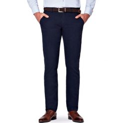 Spodnie Granatowe Chino Tommy. Czarne chinosy męskie marki LANCERTO, s, w kolorowe wzory, z elastanu. Za 299,90 zł.