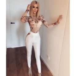 Białe spodnie RING. Białe spodnie damskie Divinostyle, s, z bawełny. W wyprzedaży za 119,00 zł.
