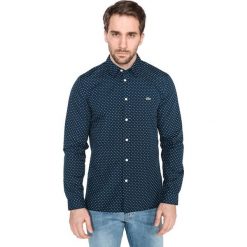 Lacoste Koszula Niebieski. Niebieskie koszule męskie Lacoste, bez wzorów, z materiału, bez kołnierzyka, z długim rękawem. Za 490,95 zł.