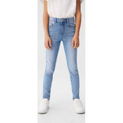 Mango Kids - Jeansy dziecięce 110-164 cm. Zielone jeansy dziewczęce Mango Kids, bez wzorów, z elastanu. Za 69,90 zł.
