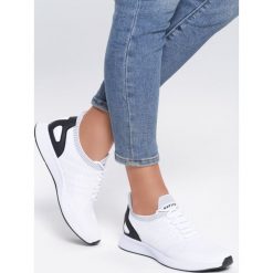 Białe Buty Sportowe Feelings. Białe buty sportowe damskie Renee, bez wzorów, z materiału, sportowe. Za 119,99 zł.