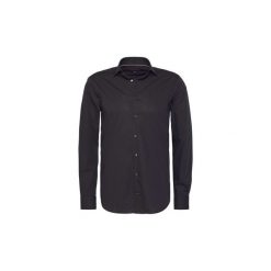 Koszule z długim rękawem Tommy Hilfiger TT0TT01936 CORE STRETCH POPELINE. Czarne koszule męskie TOMMY HILFIGER, m, bez wzorów, bez kołnierzyka, z długim rękawem. Za 291,50 zł.