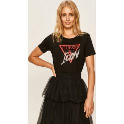 Guess Jeans - T-shirt. Żółte bluzki damskie Guess Jeans, s, z nadrukiem, z bawełny, casualowe, z okrągłym kołnierzem. Za 189,90 zł.