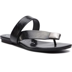 Japonki CALVIN KLEIN - Saurin E8883 Black. Czarne klapki damskie Calvin Klein, bez wzorów, ze skóry ekologicznej, bez obcasa, na obcasie. Za 519,00 zł.