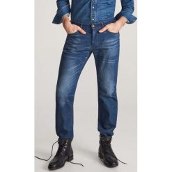 Jeansy z przetarciami - Granatowy. Niebieskie jeansy męskie Reserved, m, bez wzorów. Za 149,99 zł.
