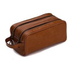Elegancka skórzana kosmetyczka Solier SZETLAND. Pomarańczowe kosmetyczki męskie Solier, bez wzorów, ze skóry, eleganckie. Za 203,00 zł.