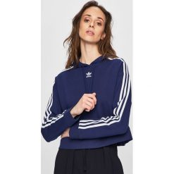 Adidas Originals - Bluza. Niebieskie bluzy damskie adidas Originals, z nadrukiem, z bawełny, bez rękawów, z kapturem. W wyprzedaży za 179,90 zł.