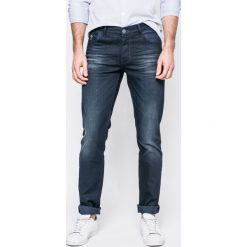 U.S. Polo - Jeansy. Niebieskie jeansy męskie slim marki U.S. Polo, z bawełny. W wyprzedaży za 269,90 zł.
