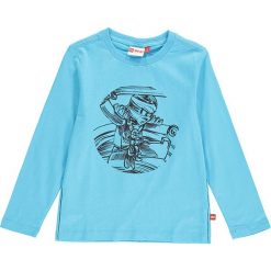Koszulka "Thomas 312" w kolorze turkusowym. Niebieskie t-shirty chłopięce marki LEGO Wear, z nadrukiem, z bawełny, z długim rękawem. W wyprzedaży za 45,95 zł.