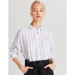 Lniana koszula oversize - Granatowy. Niebieskie koszule damskie Cropp, s, bez wzorów, bez kołnierzyka, bez rękawów. W wyprzedaży za 29,99 zł.