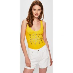 Guess Jeans - Top. Żółte bluzki damskie Guess Jeans, s, z nadrukiem, z bawełny, bez kołnierzyka. Za 119,90 zł.