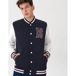 Bluza typu college - Granatowy. Niebieskie bluzy męskie House, s, bez wzorów, bez kołnierzyka, bez rękawów, bez kaptura. Za 129,99 zł.