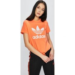 Adidas Originals - Top. Pomarańczowe t-shirty damskie adidas Originals, s, z nadrukiem, z elastanu, z okrągłym kołnierzem. W wyprzedaży za 99,90 zł.